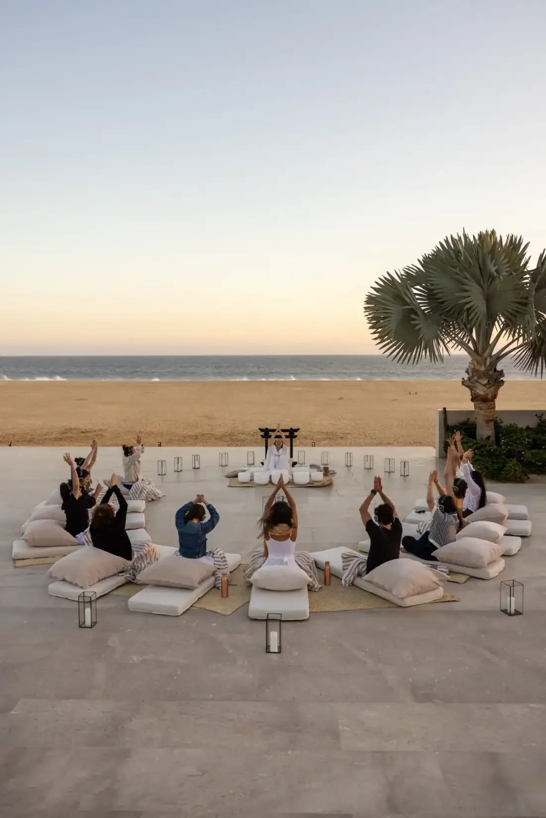 An elevated view of a circular beach session at sunrise in Los Cabos