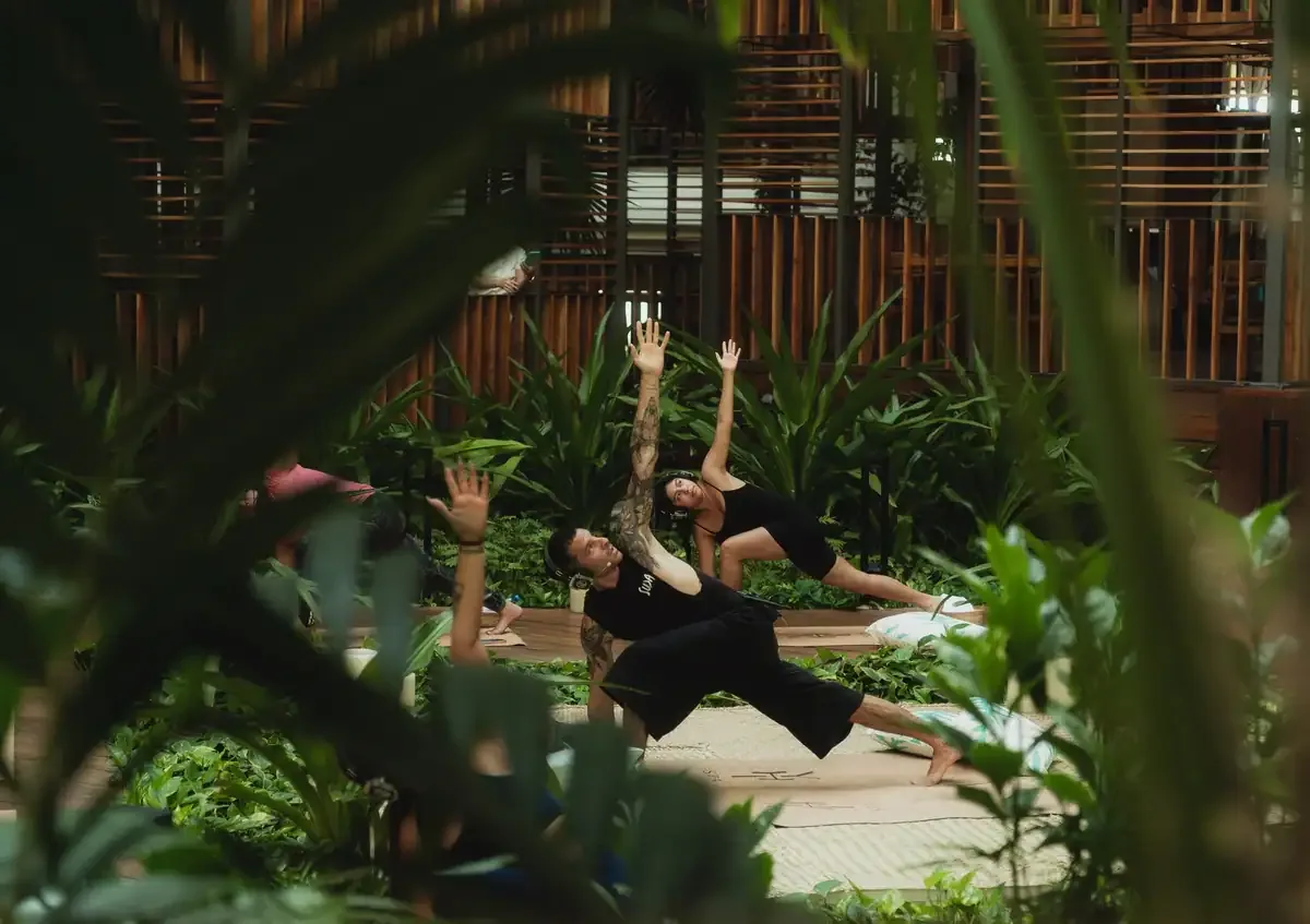 Immersive yoga among the gardens at a Paradisus resort